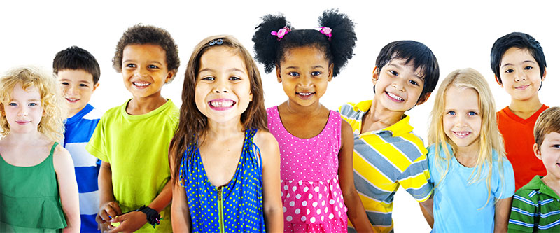 A group of diverse children with varying skin tones, posing for a photo.